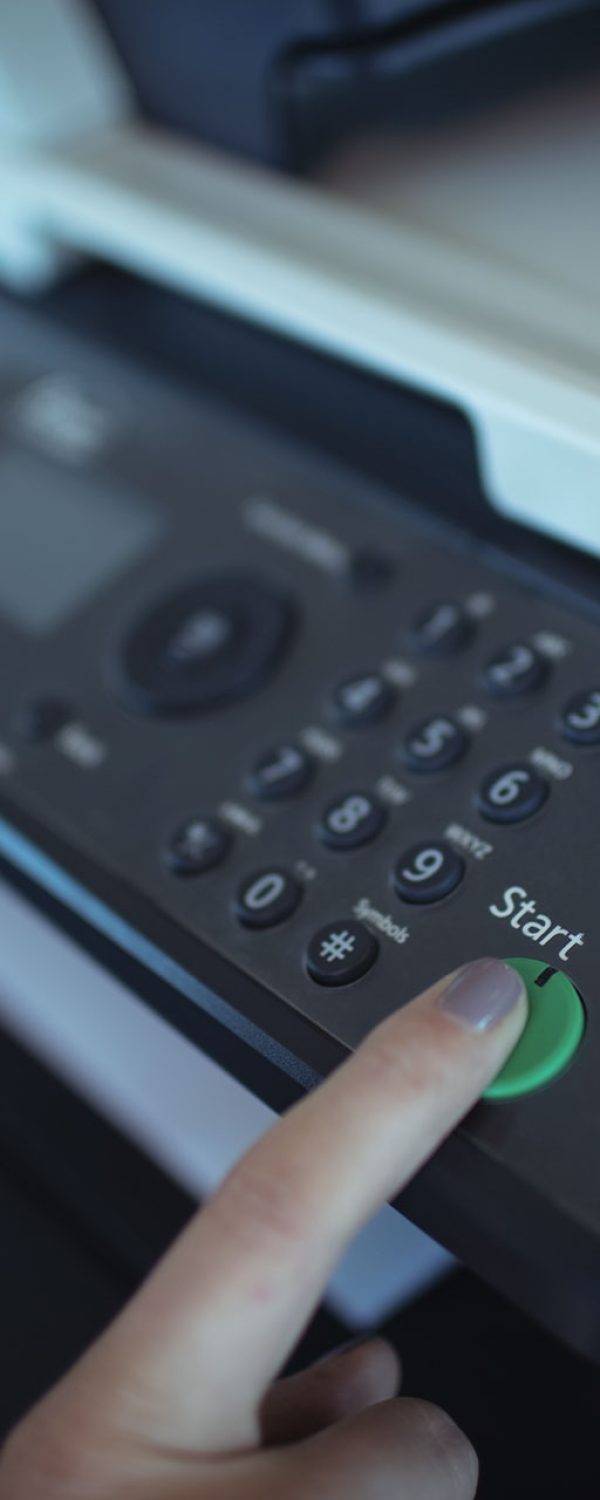 hand-on-businesswoman-using-copy-machine-ESF2F6Q hand-on-businesswoman-using-copy-machine-ESF2F6Q